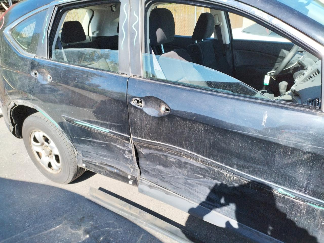 Photo 9 from auction – 2013 HONDA CRV with VIN 2HKRM4H36DH648629