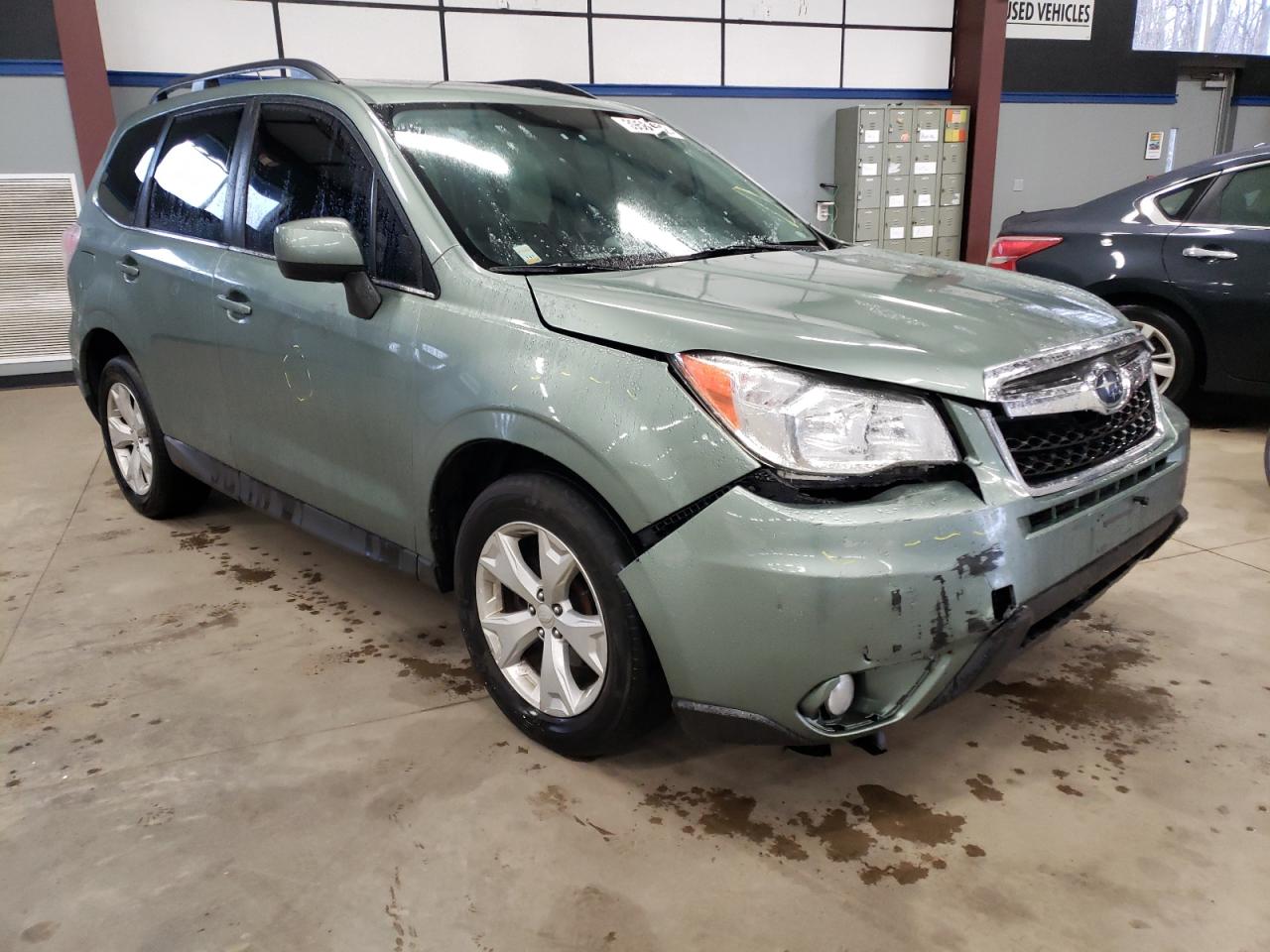 SUBARU FORESTER 2 2014 with VIN JF2SJAJC2EH517895 - Photo from auction