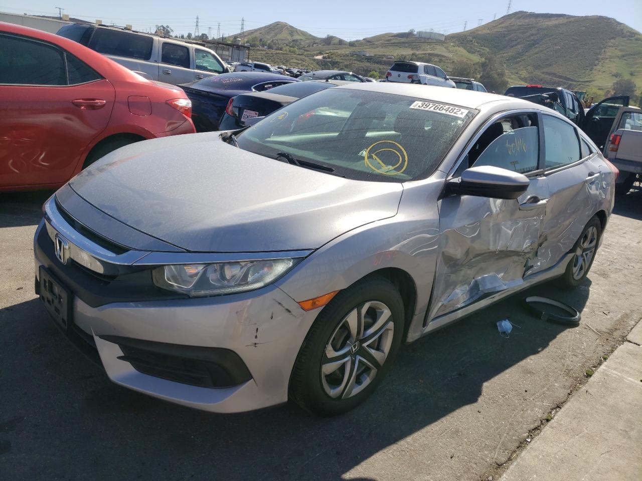 Photo 2 from auction – 2017 HONDA CIVIC LX with VIN 2HGFC2F55HH507310