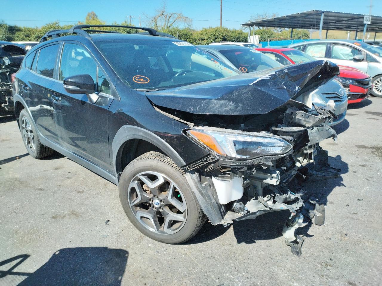 SUBARU CROSSTREK 2018 with VIN JF2GTAMC8J8261915 - Photo from auction