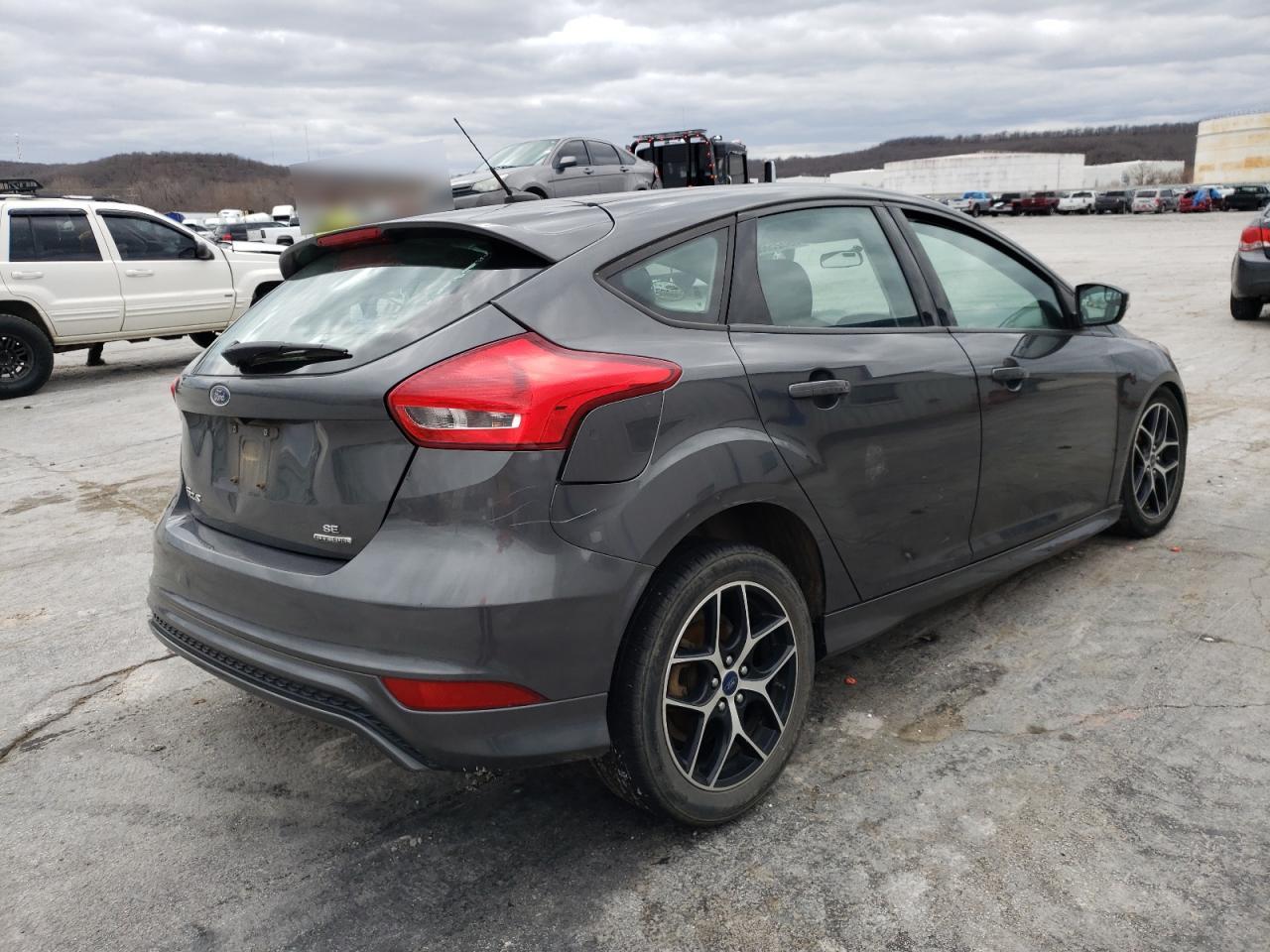 Photo 4 from auction – 2016 FORD FOCUS SE with VIN 1FADP3K21GL398721