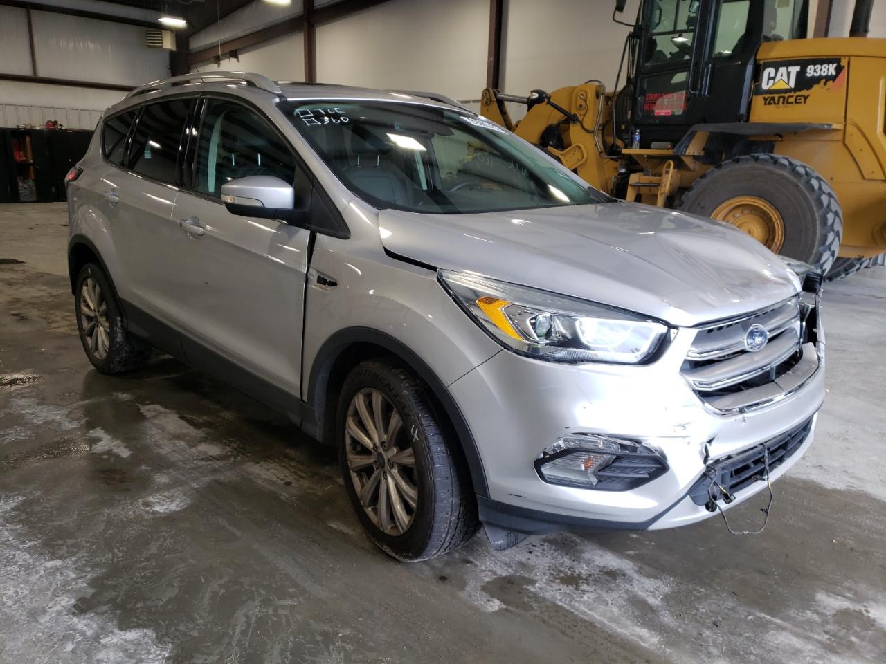 FORD ESCAPE TIT 2017 with VIN 1FMCU0JD1HUC30889 - Photo from auction