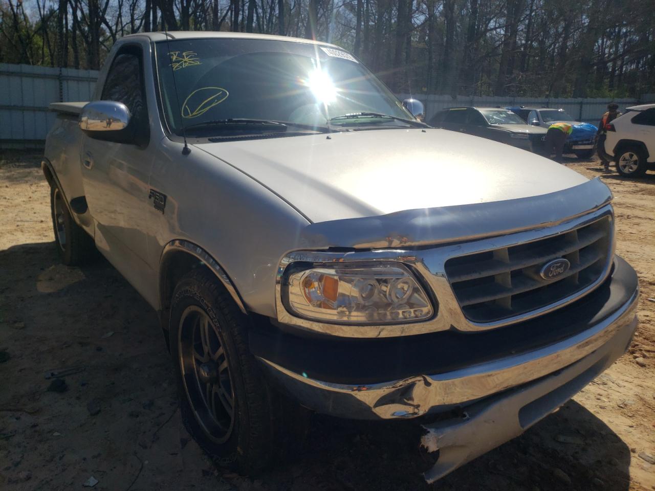 FORD F150 2000 with VIN 1FTRF07L4YKA25697 - Photo from auction