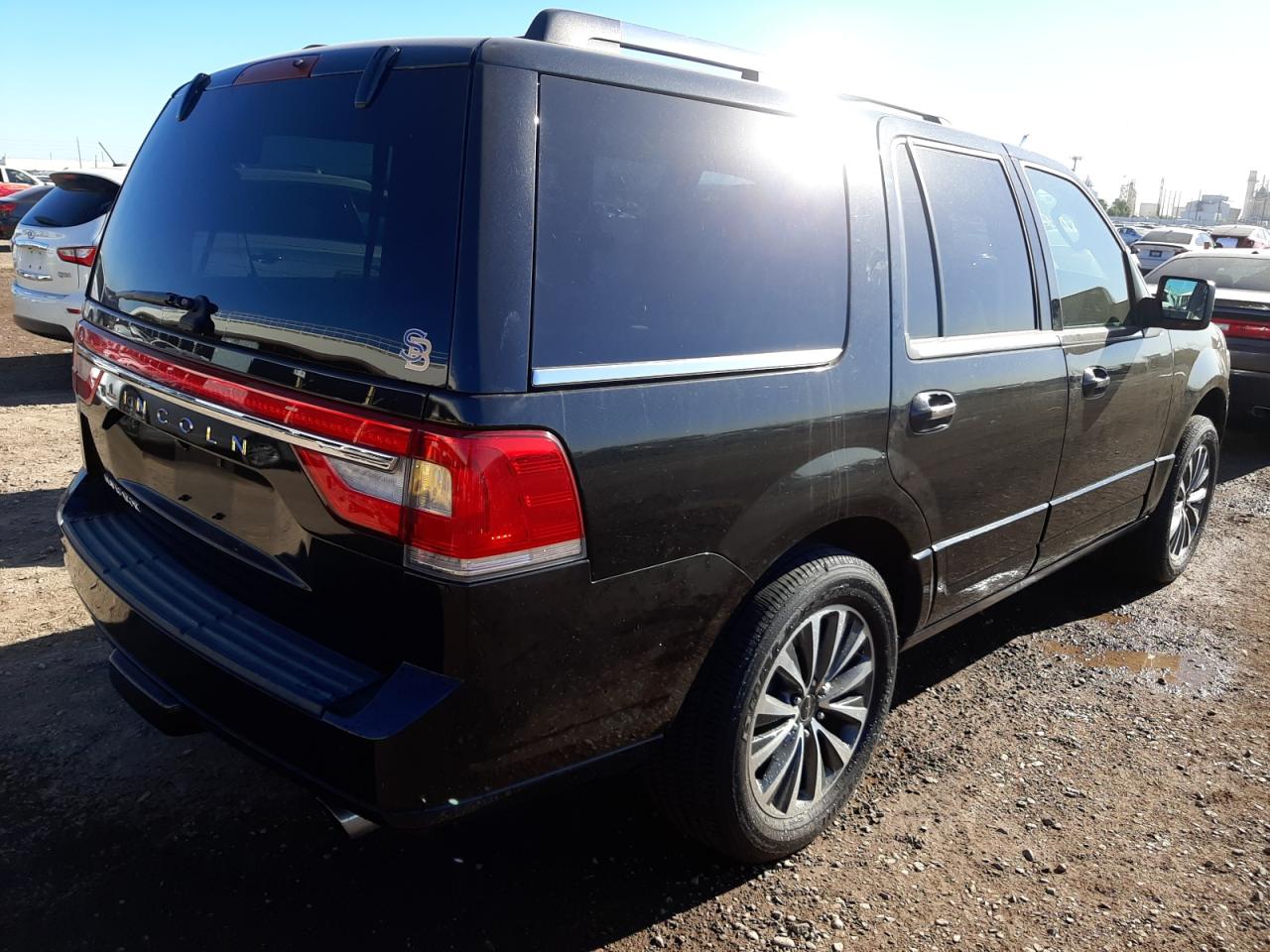 Photo 4 from auction – 2015 LINCOLN NAVIGATOR with VIN 5LMJJ2HT6FEJ07327