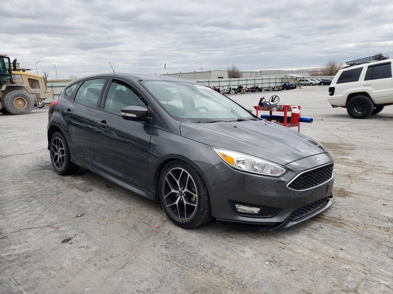 FORD FOCUS SE 2016 with VIN 1FADP3K21GL398721 - Photo from auction