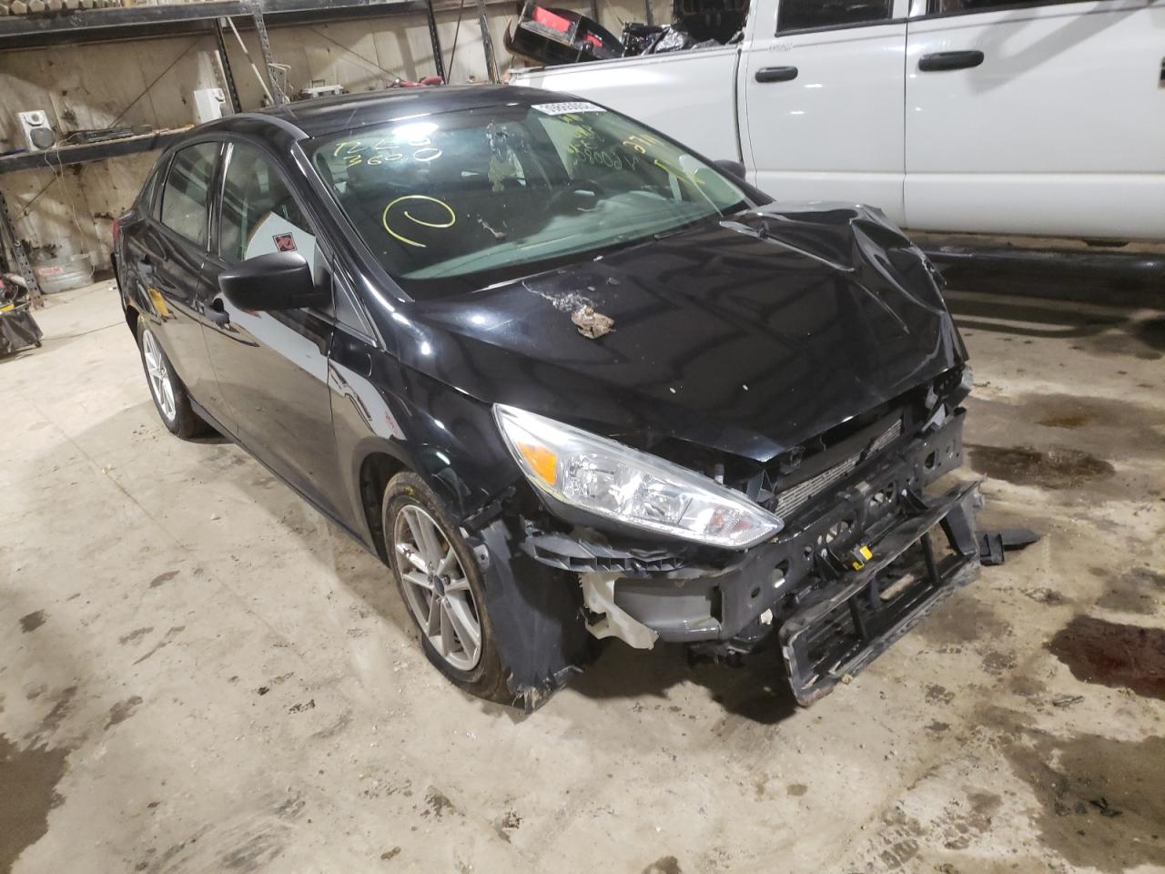 FORD FOCUS S 2018 with VIN 1FADP3E22JL202711 - Photo from auction