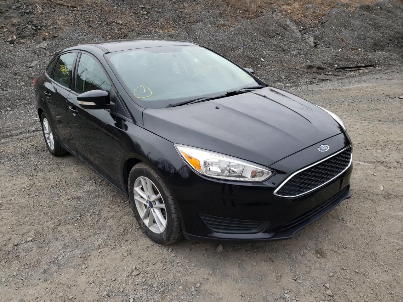 FORD FOCUS SE 2017 with VIN 1FADP3F20HL335783 - Photo from auction