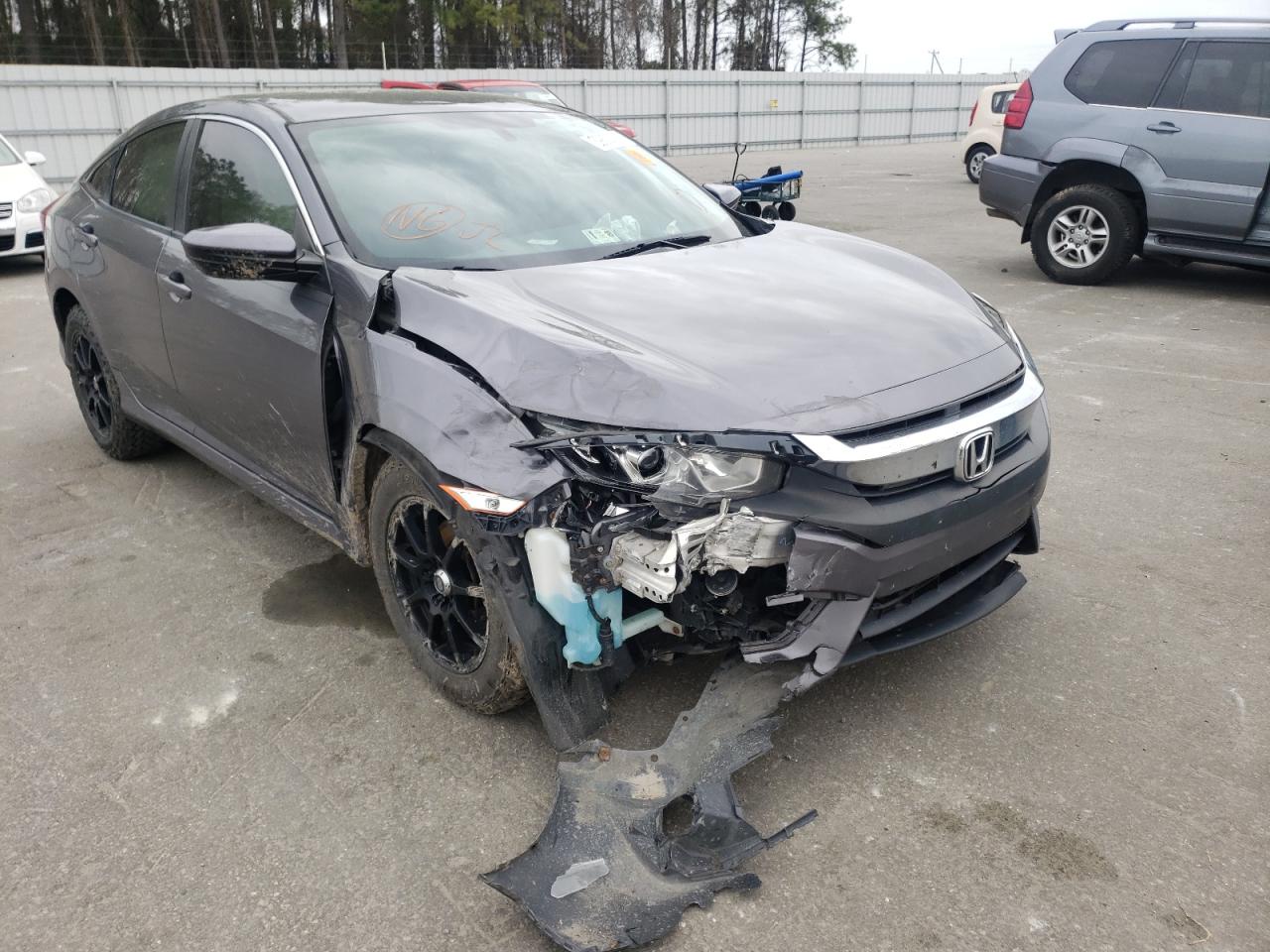 HONDA CIVIC LX 2017 with VIN 19XFC2F59HE016152 - Photo from auction