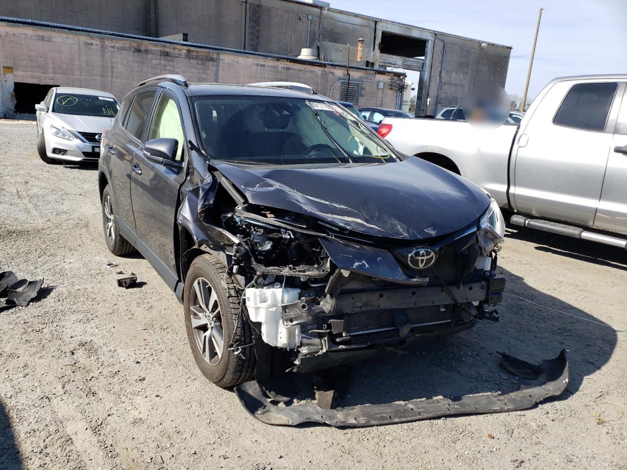 Photo 9 from auction – 2018 TOYOTA RAV4 with VIN JTMRFREV9JJ186731