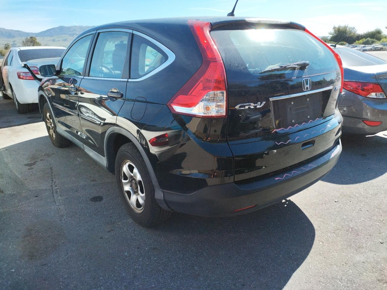 Photo 3 from auction – 2013 HONDA CRV with VIN 2HKRM4H36DH648629