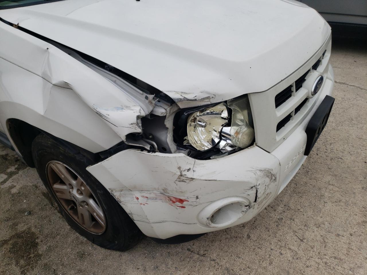 Photo 9 from auction – 2009 FORD ESCAPE LIM with VIN 1FMCU49309KA09915