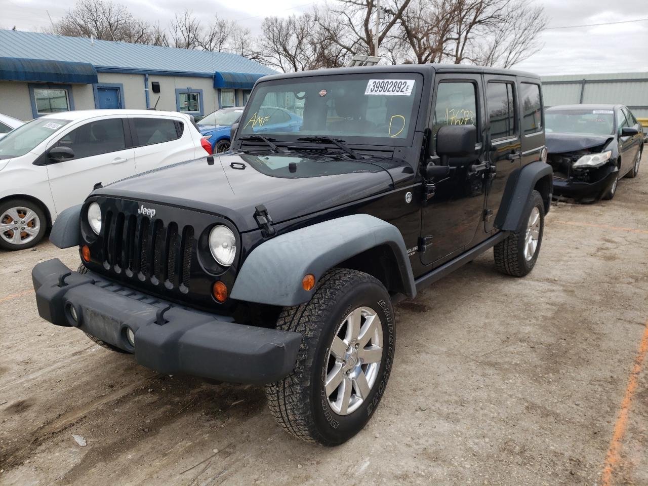 Photo 2 from auction – 2011 JEEP WRANGLER U with VIN 1J4BA6H18BL636649