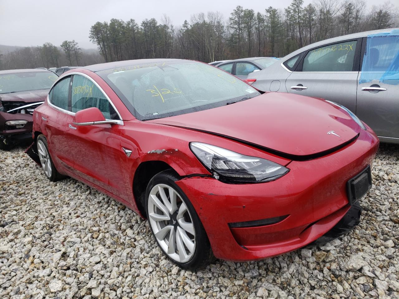 TESLA MODEL 3 2018 with VIN 5YJ3E1EA9JF015458 - Photo from auction