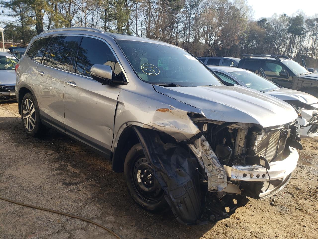 HONDA PILOT ELIT 2018 with VIN 5FNYF6H06JB025447 - Photo from auction