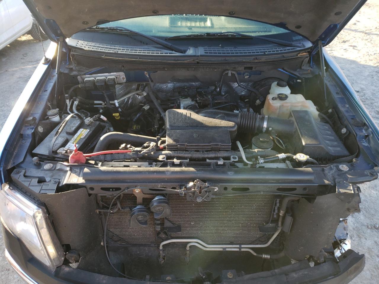 Photo 7 from auction – 2010 FORD F150 with VIN 1FTMF1CW7AKE73244