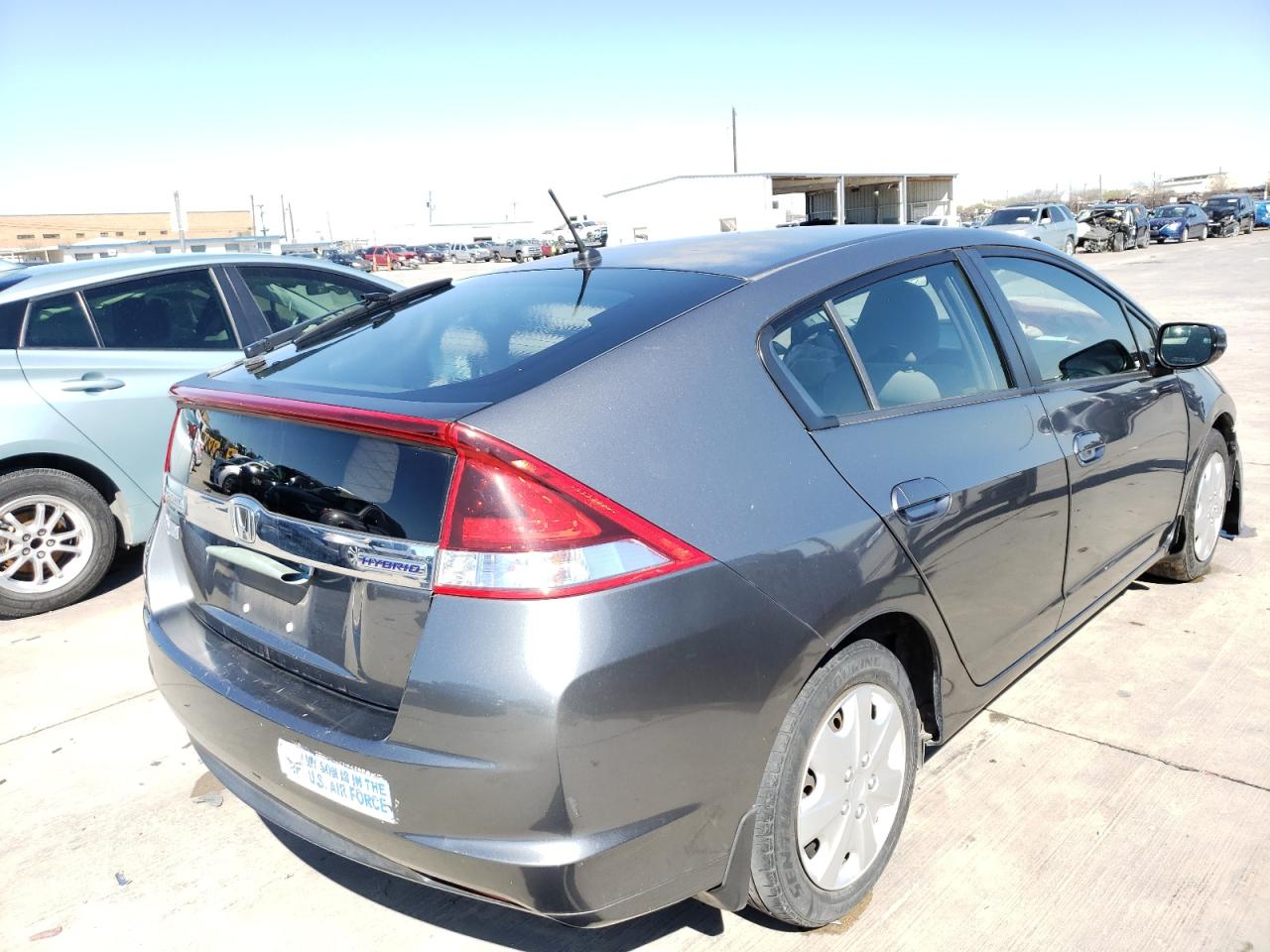 Photo 4 from auction – 2012 HONDA INSIGHT LX with VIN JHMZE2H50CS002634