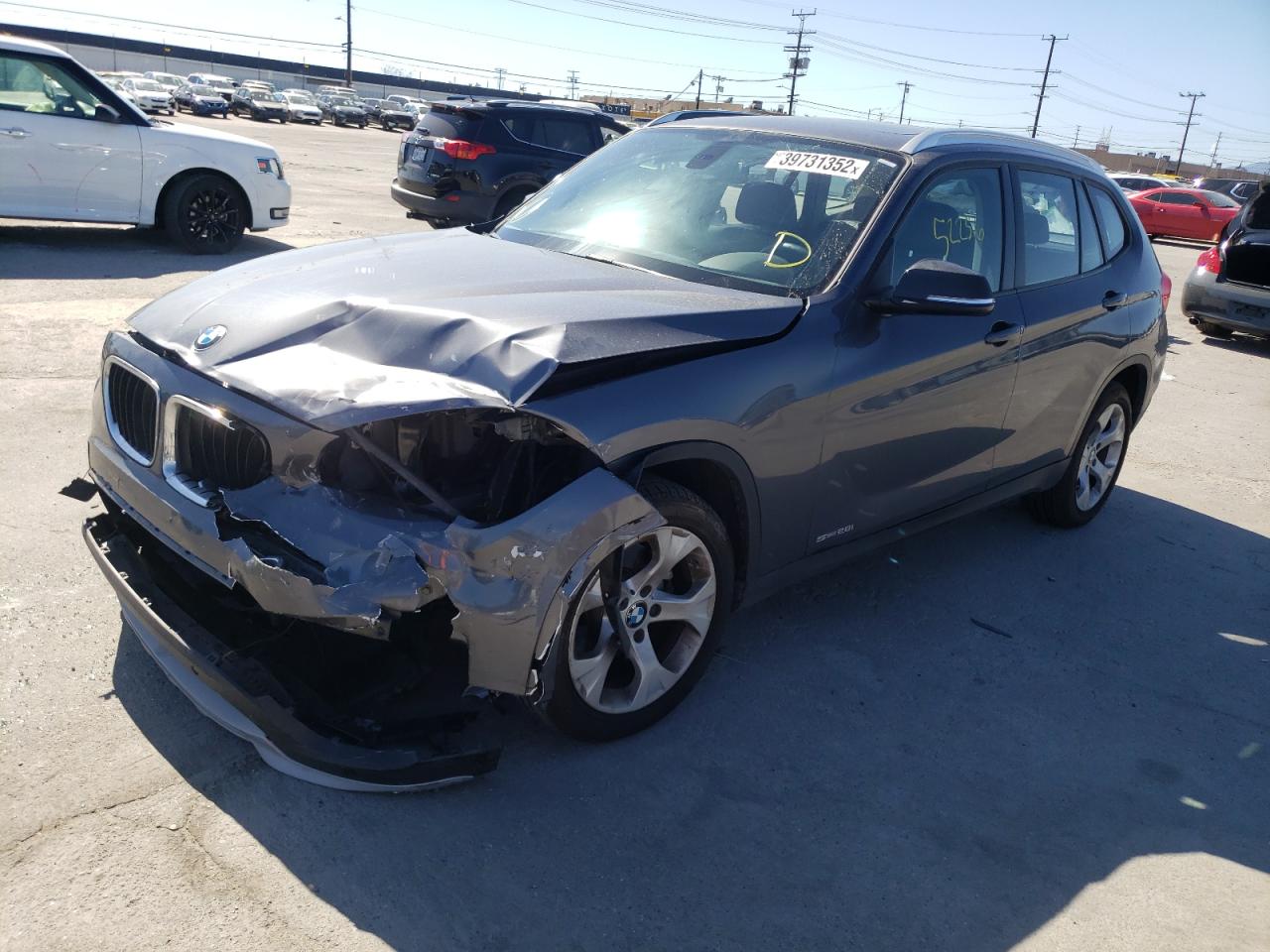 Photo 2 from auction – 2015 BMW X1 SDRIVE2 with VIN WBAVM1C52FV318699