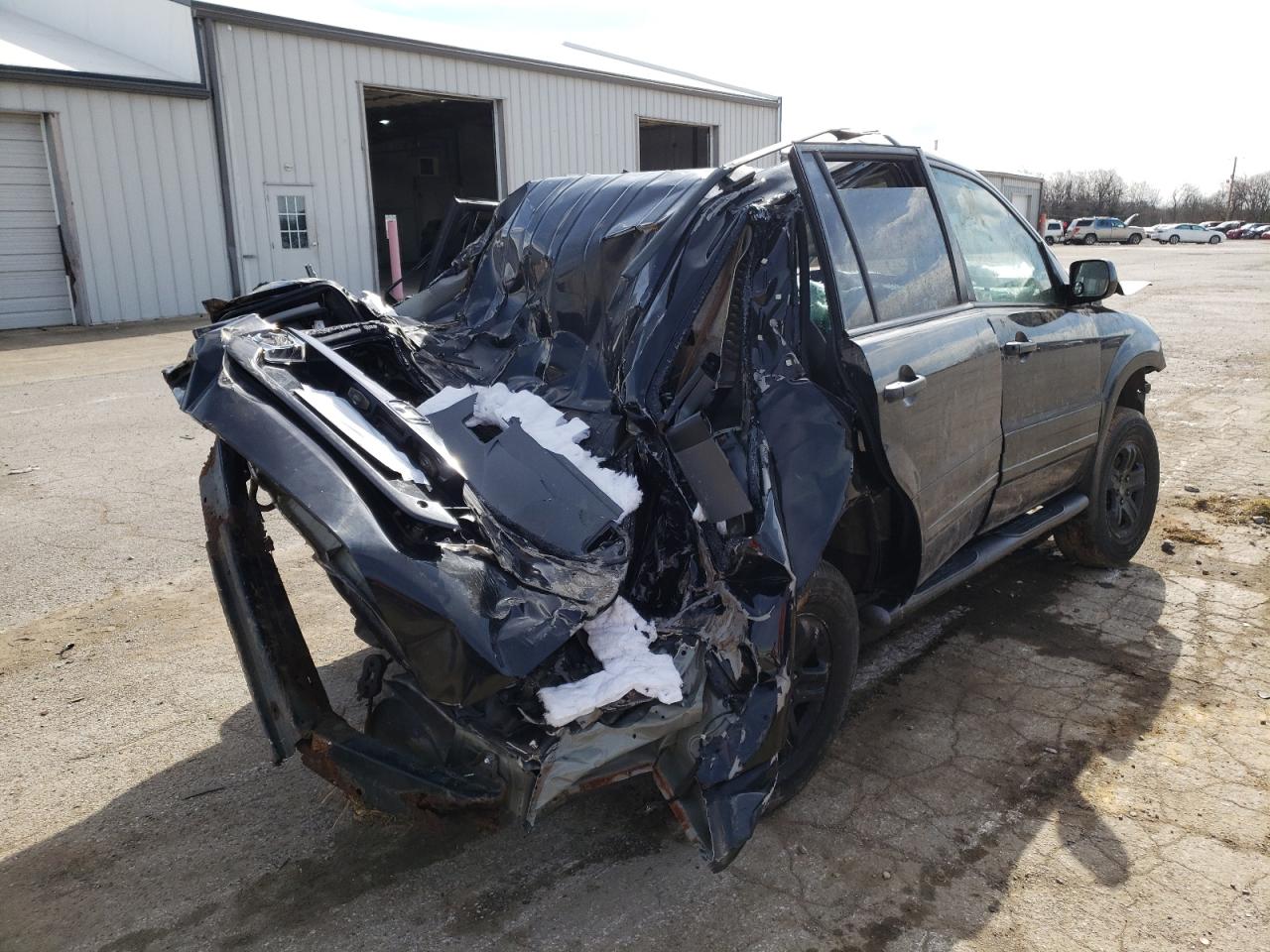Photo 4 from auction – 2003 HONDA PILOT EX with VIN 2HKYF18483H576103