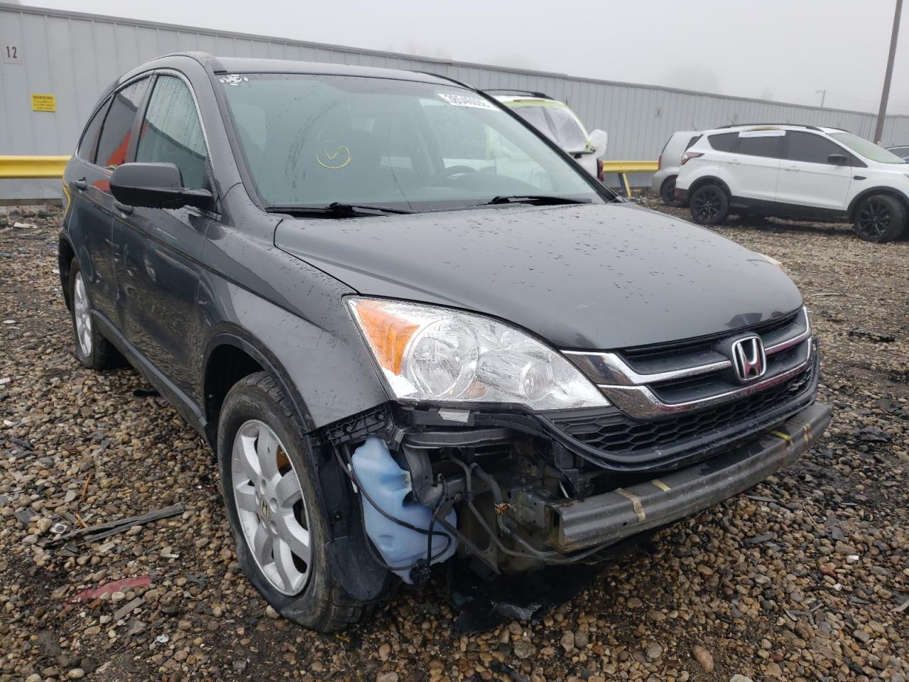 HONDA CR-V SE 2011 with VIN 5J6RE4H41BL100014 - Photo from auction