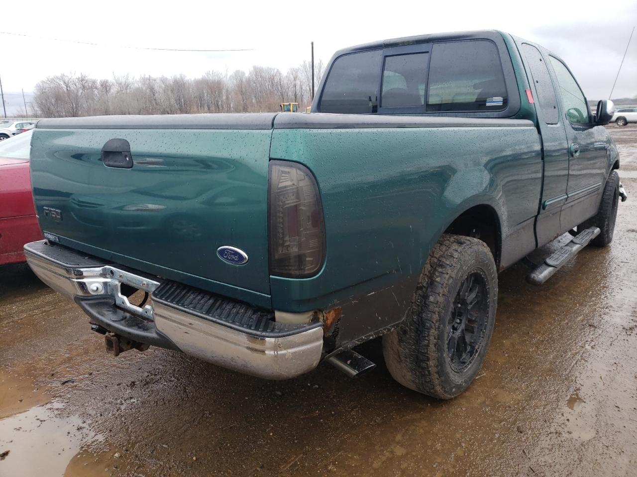 Photo 4 from auction – 2000 FORD F150 with VIN 1FTRX17L3YNB66228