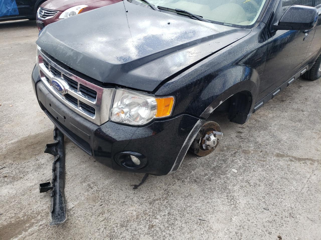 Photo 9 from auction – 2012 FORD ESCAPE LIM with VIN 1FMCU9EG8CKB60983