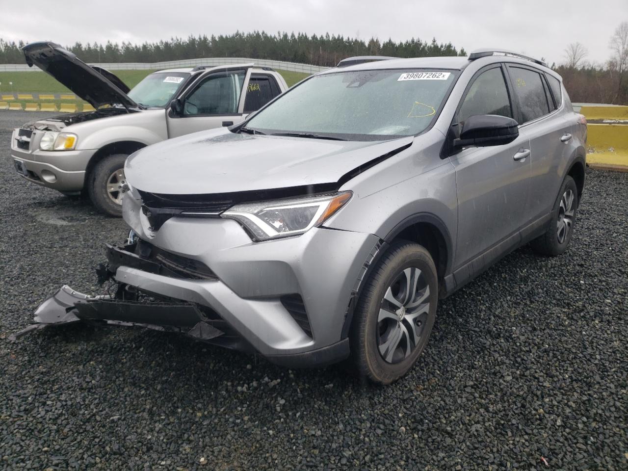 Photo 2 from auction – 2018 TOYOTA RAV4 LE with VIN JTMZFREV1JD122083