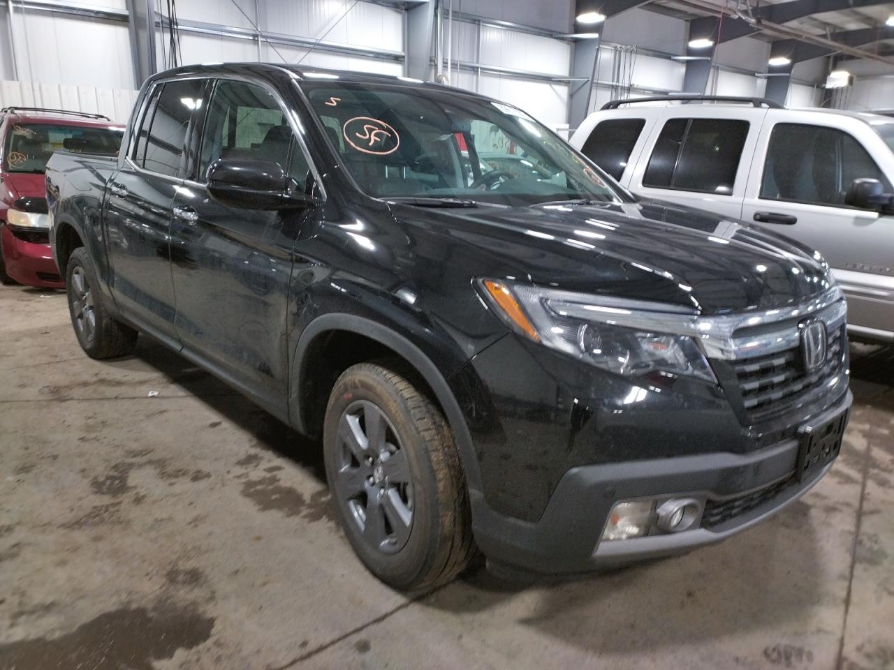 HONDA RIDGELINE 2020 with VIN 5FPYK3F70LB004873 - Photo from auction