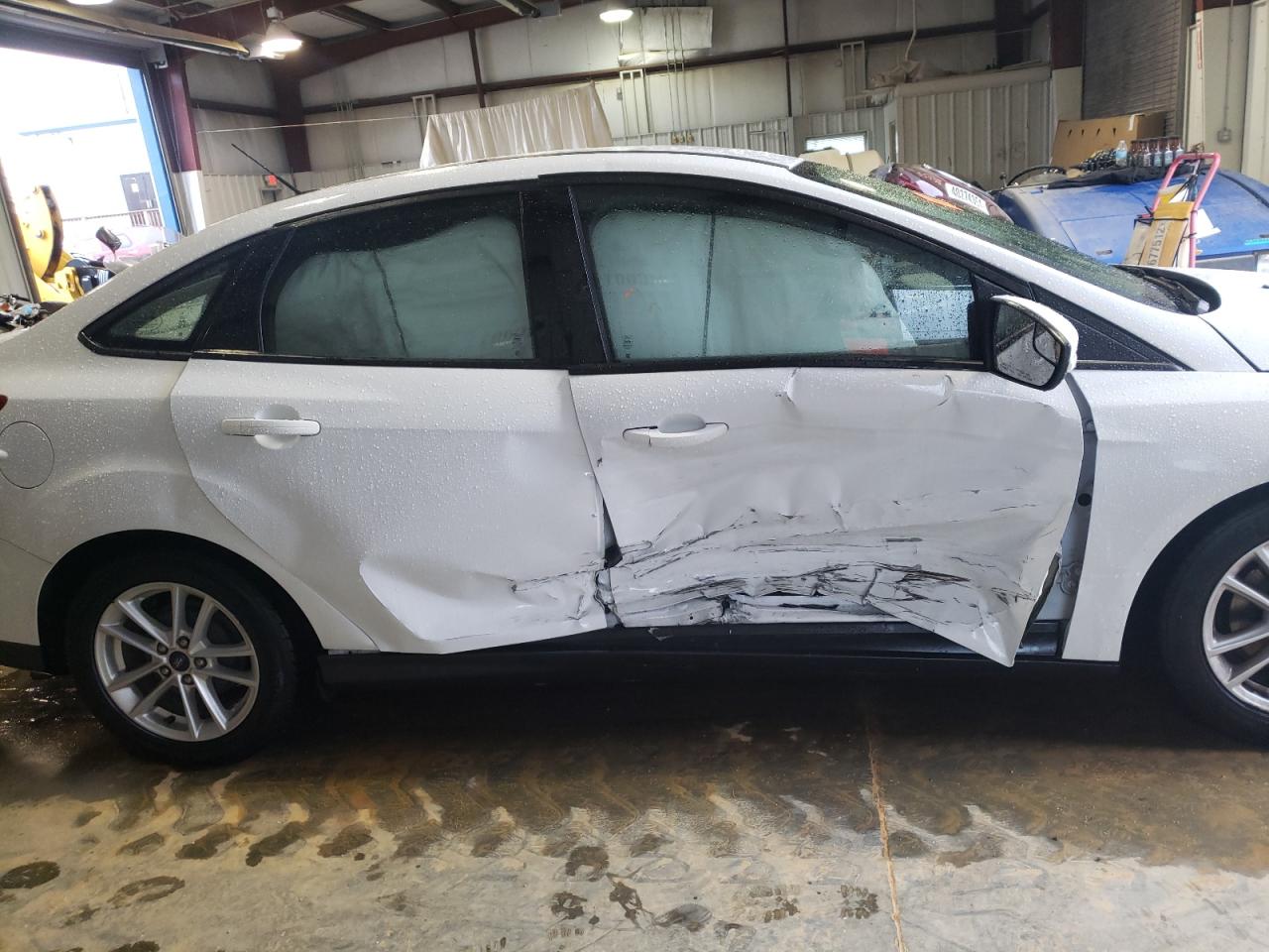 Photo 9 from auction – 2017 FORD FOCUS SE with VIN 1FADP3F21HL246501