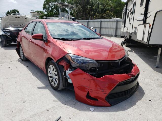 TOYOTA COROLLA L 2019 with VIN 5YFBURHE9KP875233 - Photo from auction