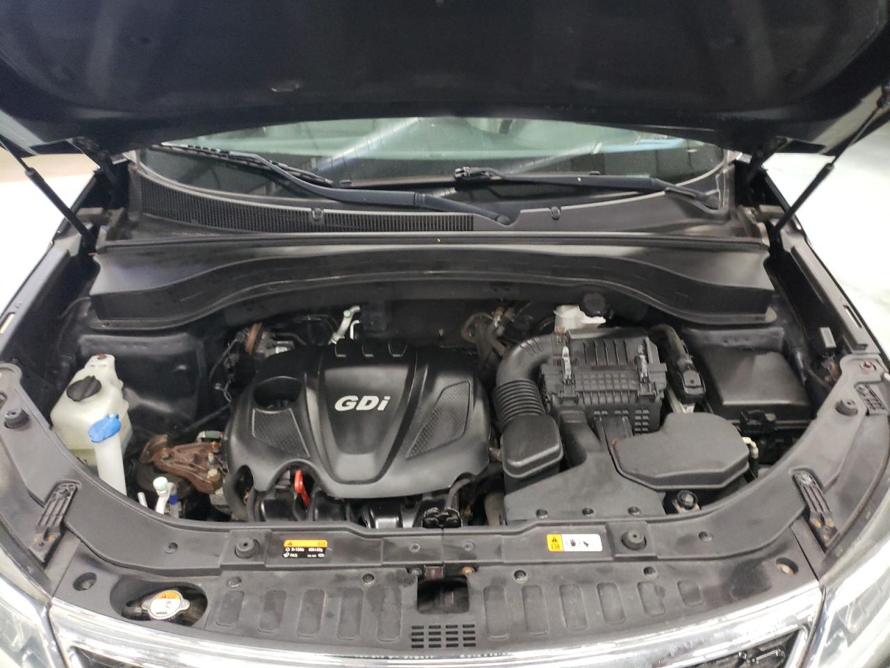 Photo 7 from auction – 2015 KIA SORENTO LX with VIN 5XYKTCA60FG617373