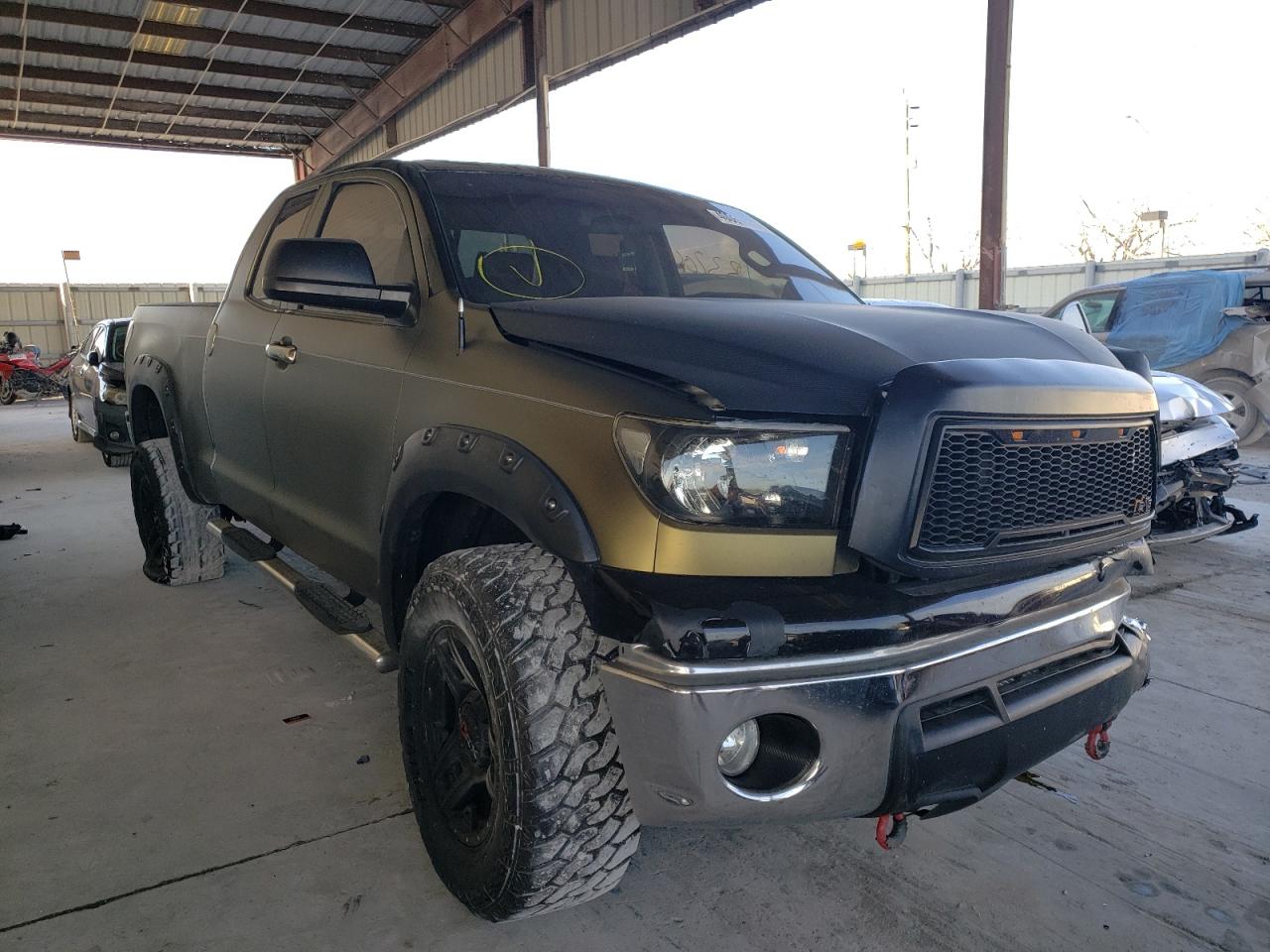 TOYOTA TUNDRA 2011 with VIN 5TFRM5F11BX021796 - Photo from auction