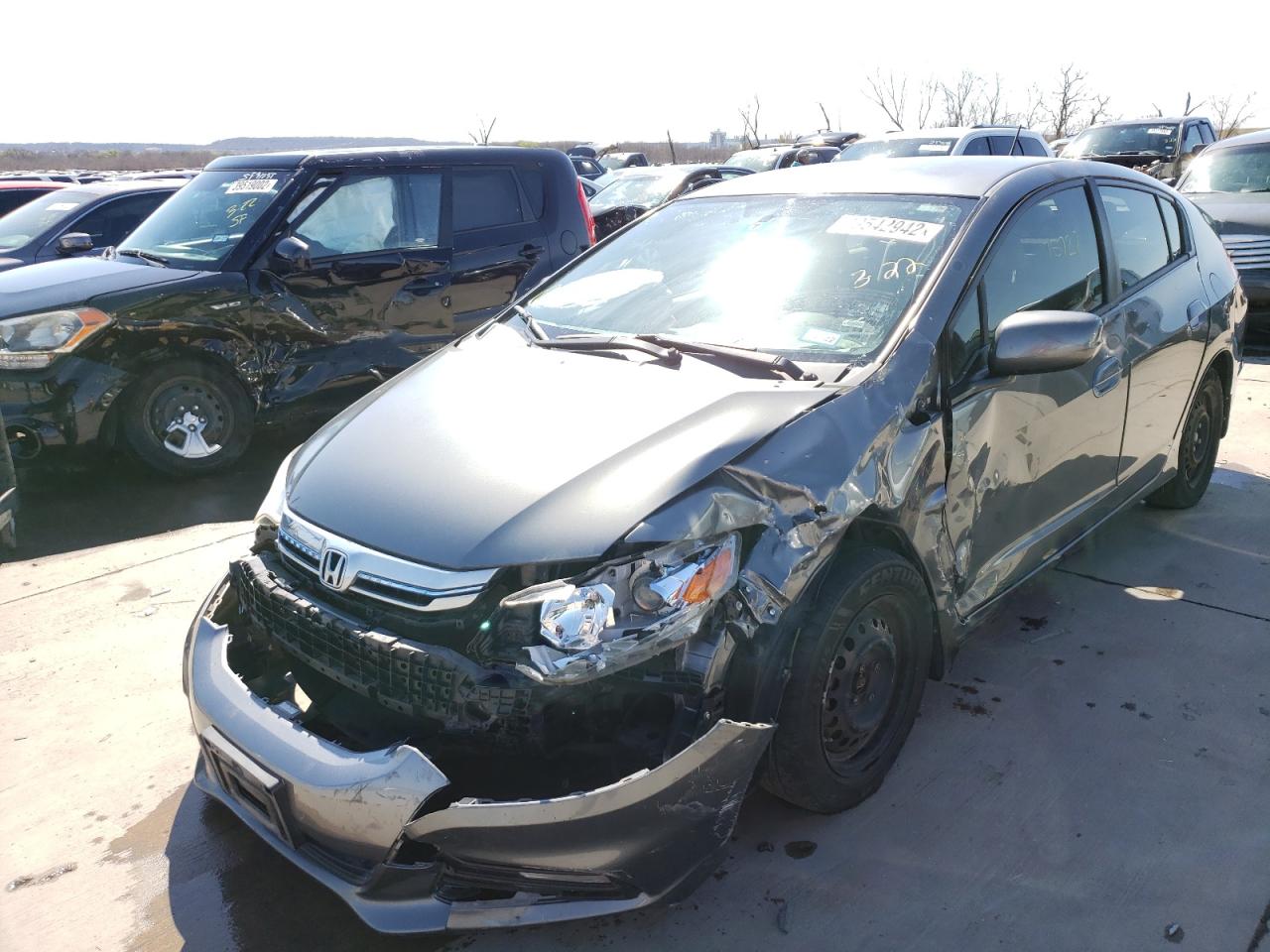 Photo 2 from auction – 2012 HONDA INSIGHT LX with VIN JHMZE2H50CS002634