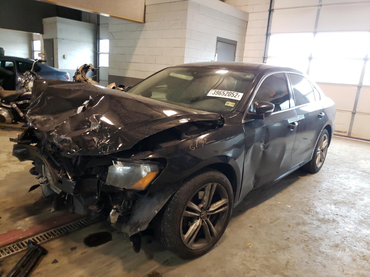 Photo 2 from auction – 2014 VOLKSWAGEN PASSAT SE with VIN 1VWBP7A34EC020065