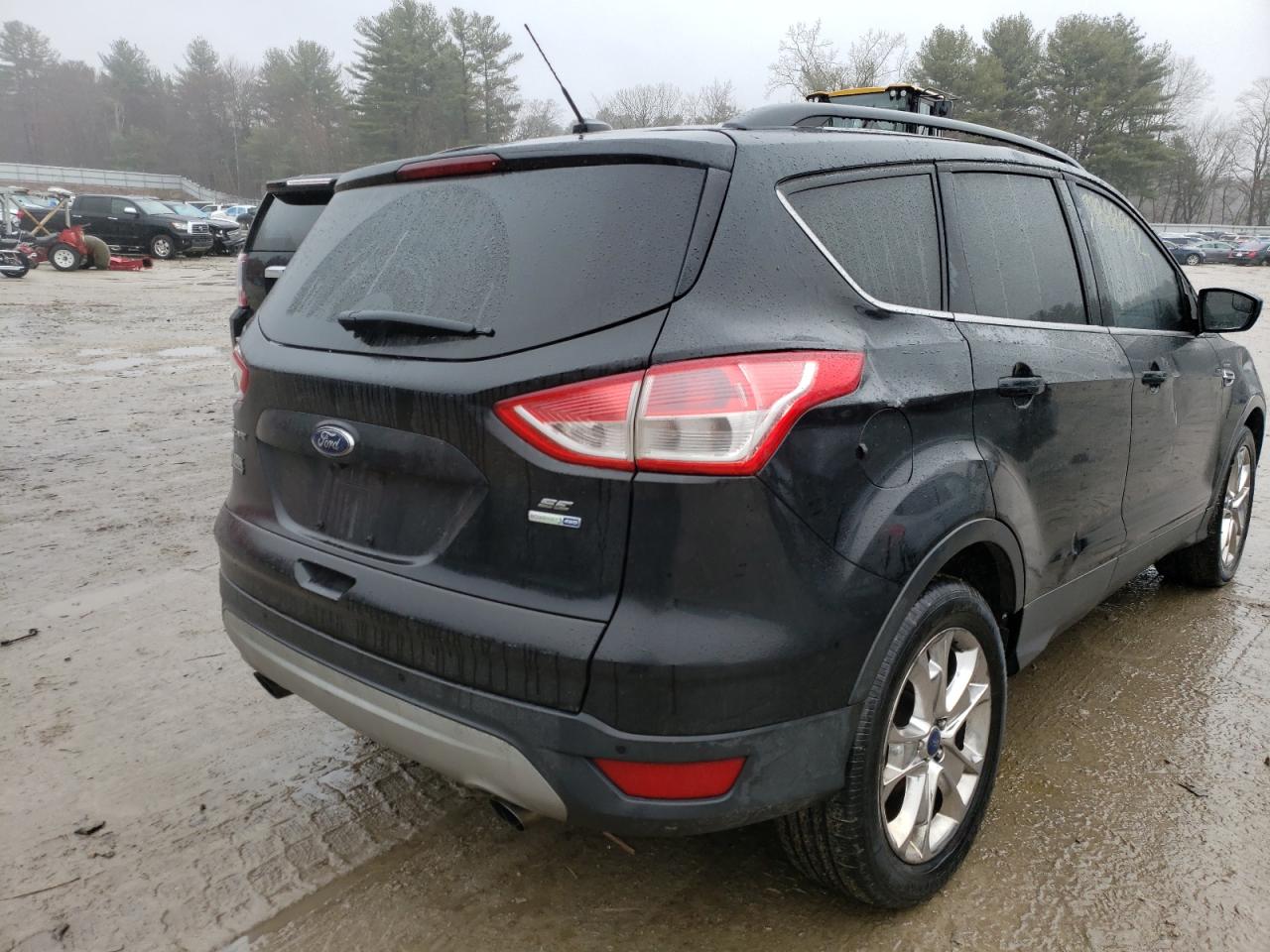 Photo 4 from auction – 2014 FORD ESCAPE SE with VIN 1FMCU9G96EUE31450