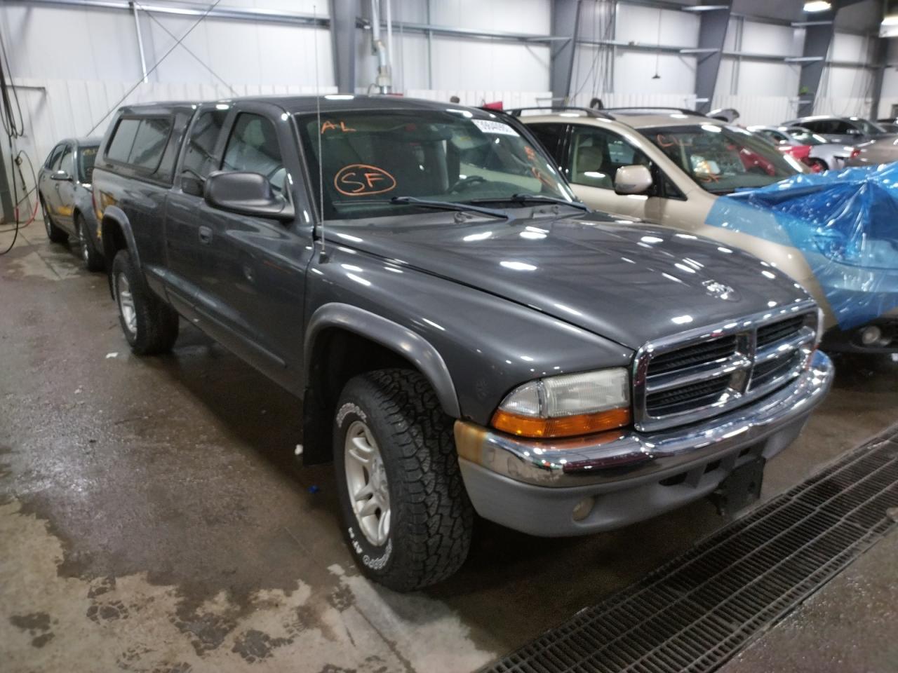 DODGE DAKOTA SLT 2004 with VIN 1D7HG42N74S687170 - Photo from auction