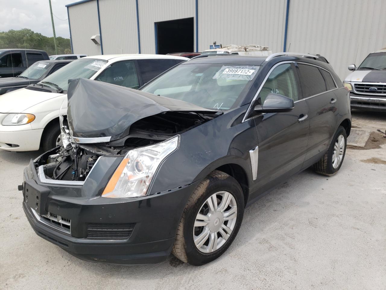 Photo 2 from auction – 2015 CADILLAC SRX LUXURY with VIN 3GYFNBE30FS620482