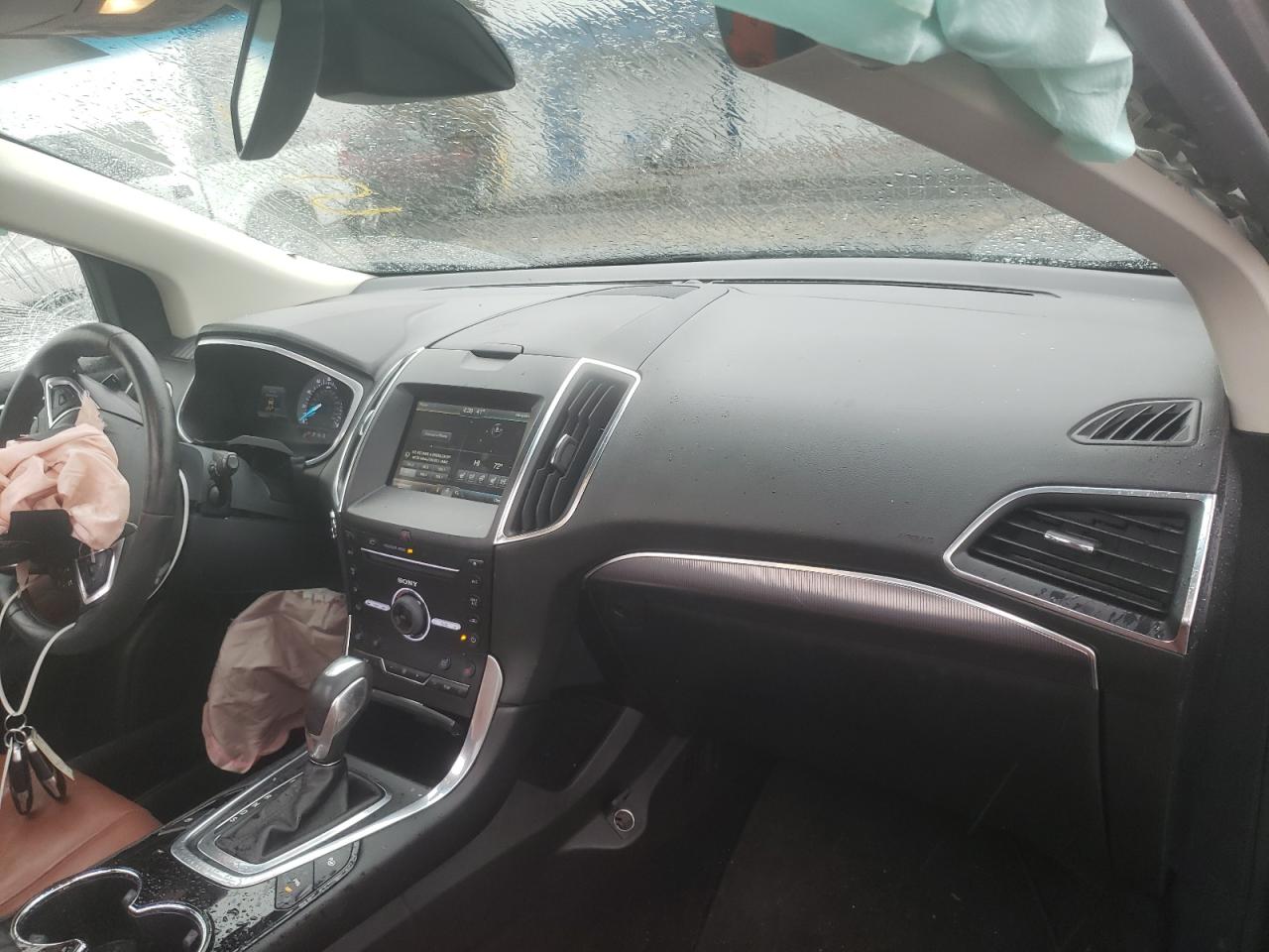 Photo 9 from auction – 2015 FORD EDGE TITAN with VIN 2FMPK4K85FBB00133