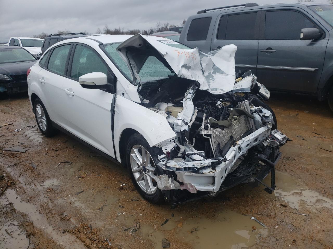 FORD FOCUS SE 2015 with VIN 1FADP3F2XFL385183 - Photo from auction