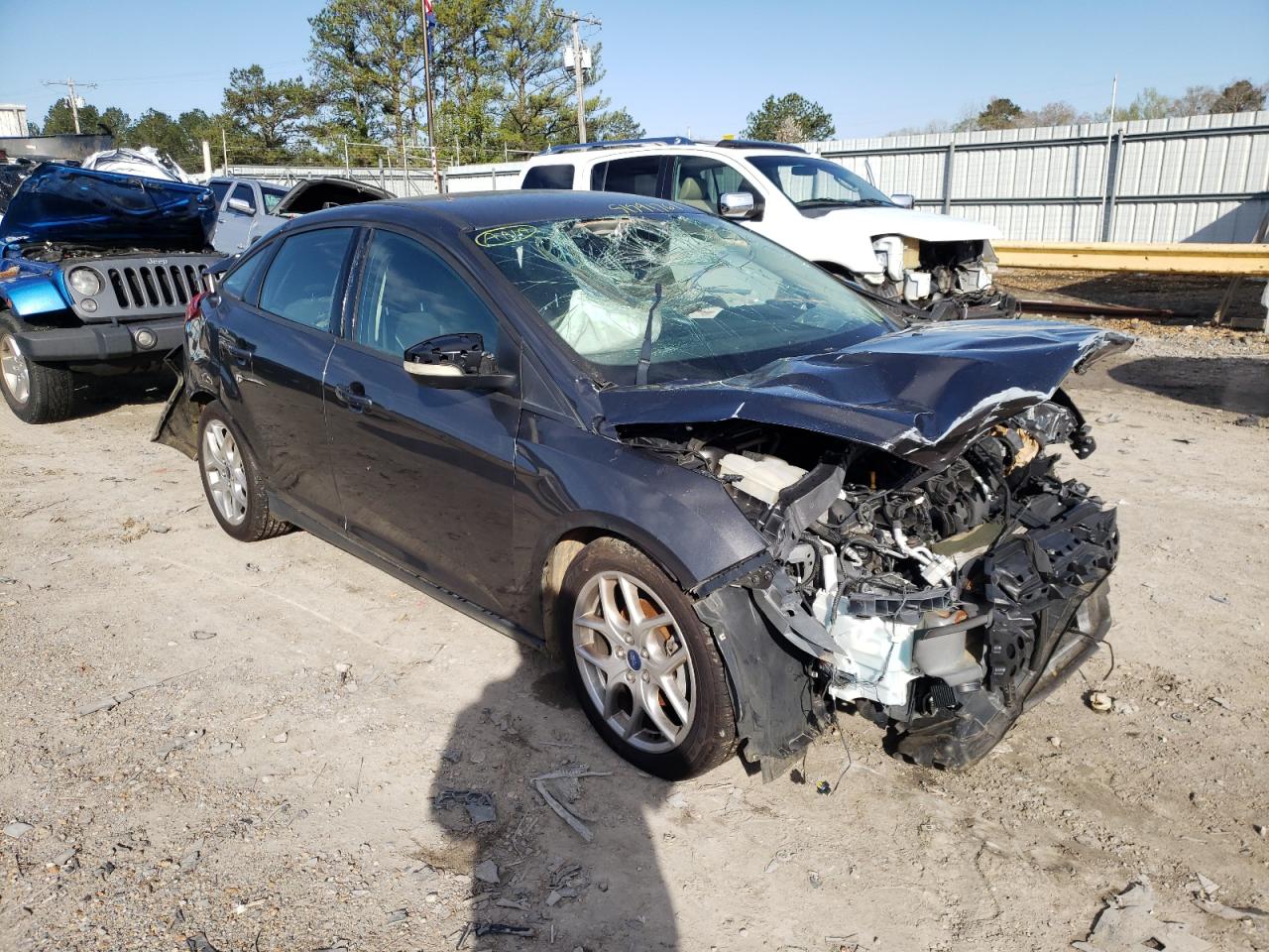 FORD FOCUS SE 2015 with VIN 1FADP3F29FL345502 - Photo from auction