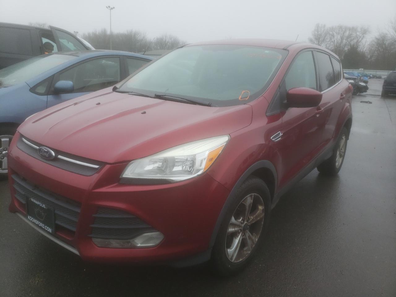 Photo 2 from auction – 2013 FORD ESCAPE SE with VIN 1FMCU0GX2DUD33475