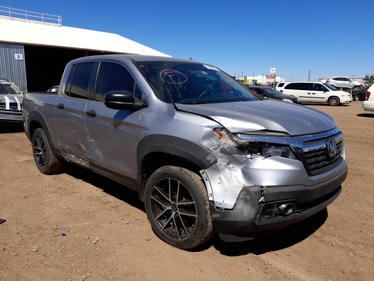 HONDA RIDGELINE 2017 with VIN 5FPYK2F2XHB007379 - Photo from auction