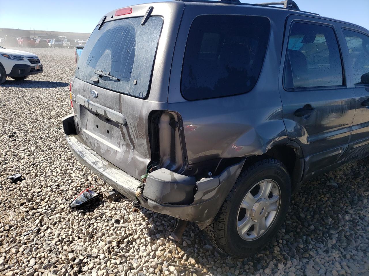 Photo 9 from auction – 2003 FORD ESCAPE XLT with VIN 1FMYU93123KE02820