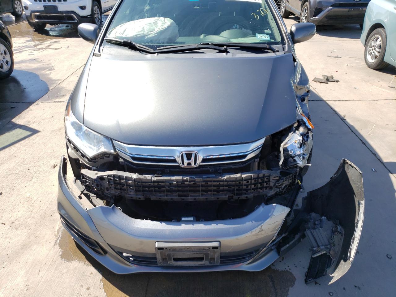 Photo 9 from auction – 2012 HONDA INSIGHT LX with VIN JHMZE2H50CS002634