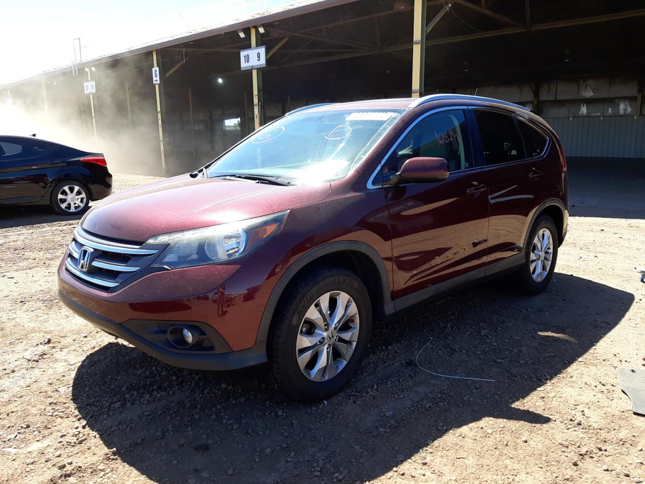 Photo 2 from auction – 2012 HONDA CR-V EXL with VIN 5J6RM4H72CL044762
