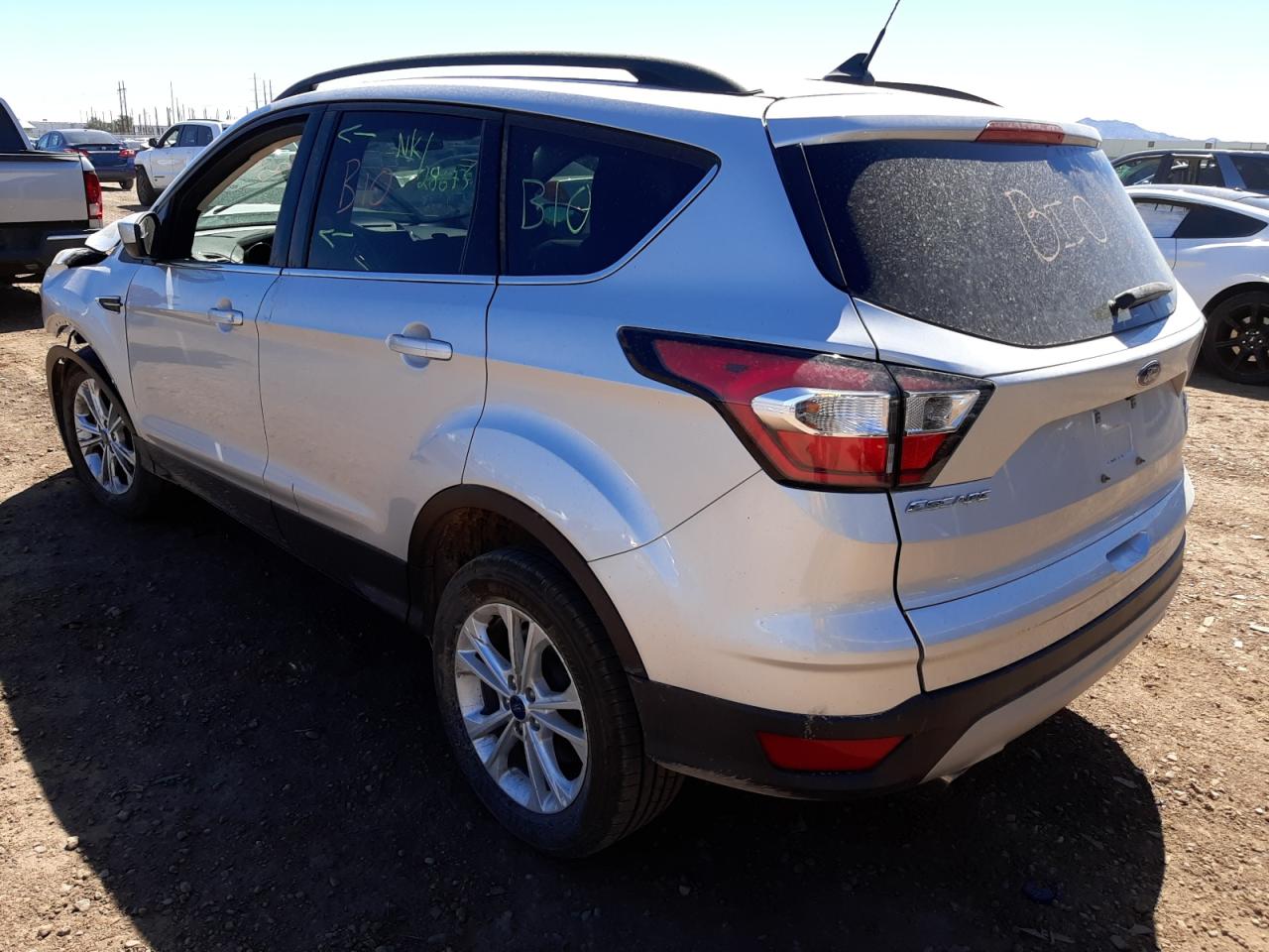 Photo 3 from auction – 2018 FORD ESCAPE SEL with VIN 1FMCU9HD9JUB74636