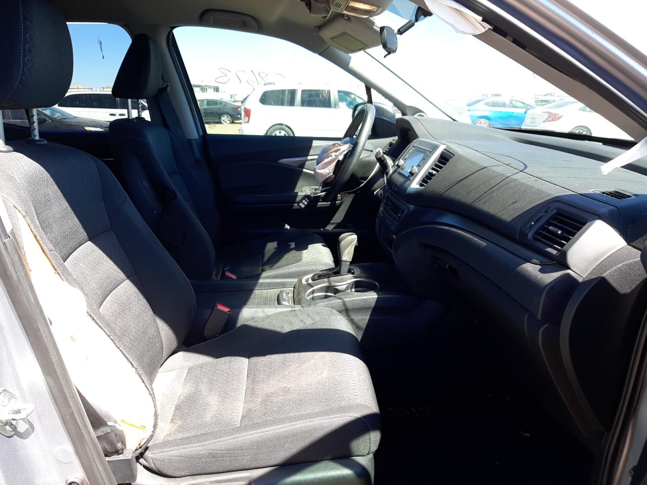 Photo 5 from auction – 2017 HONDA RIDGELINE with VIN 5FPYK2F2XHB007379