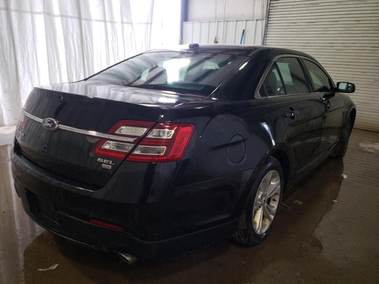 Photo 4 from auction – 2013 FORD TAURUS SEL with VIN 1FAHP2H84DG179618
