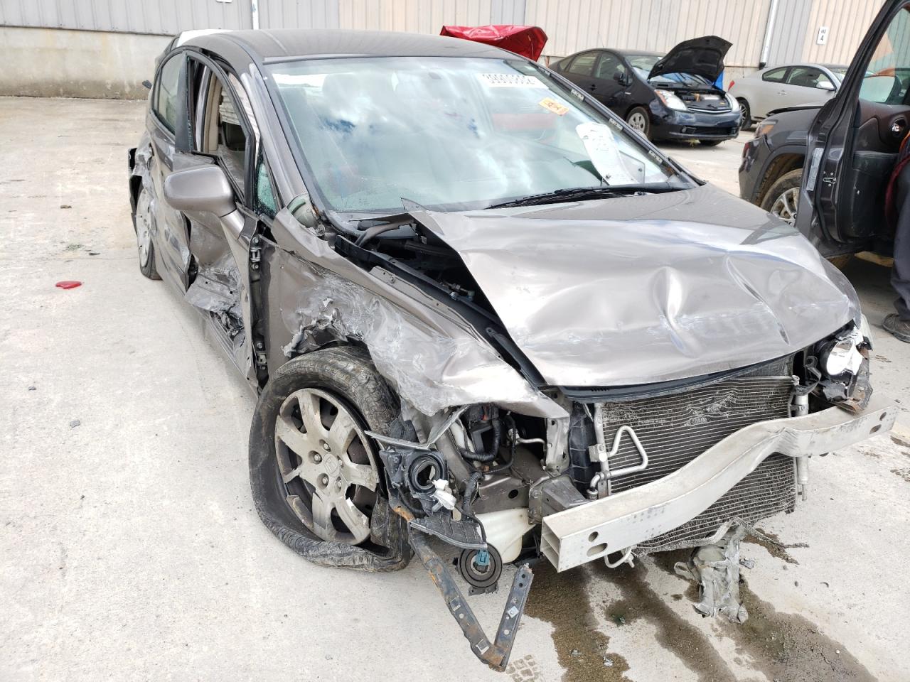 Photo 9 from auction – 2010 HONDA CIVIC LX with VIN 19XFA1F50AE018619