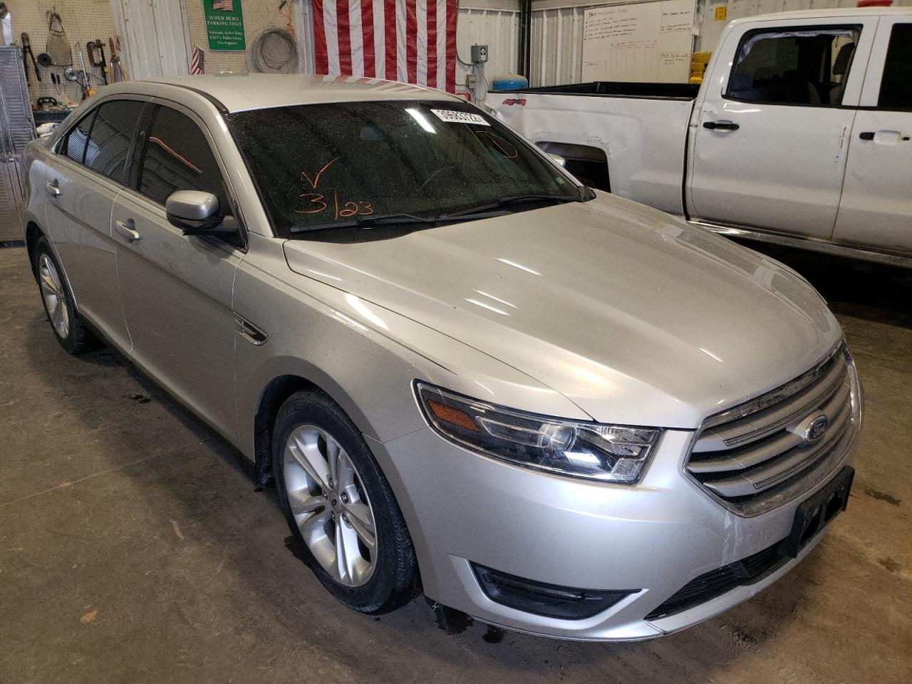 FORD TAURUS SEL 2014 with VIN 1FAHP2E93EG174537 - Photo from auction