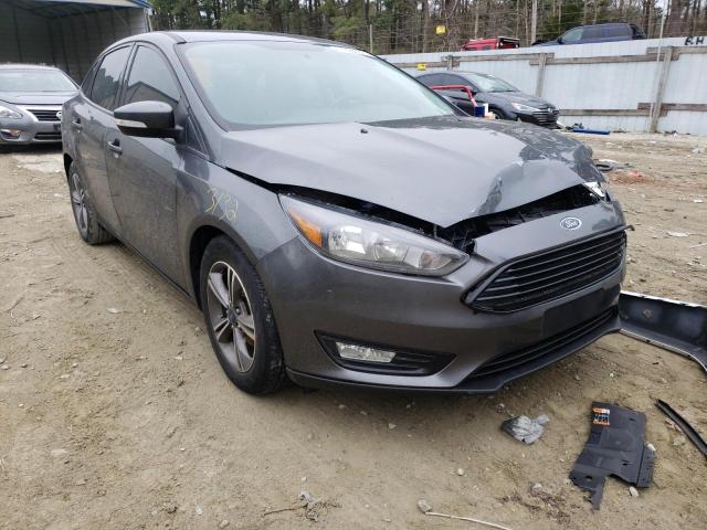 FORD FOCUS SE 2018 with VIN 1FADP3FE7JL329950 - Photo from auction